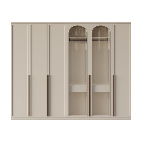 Coda Closet with off-white finish, arched ribbed glass doors, and brown metal handles for elegant storage