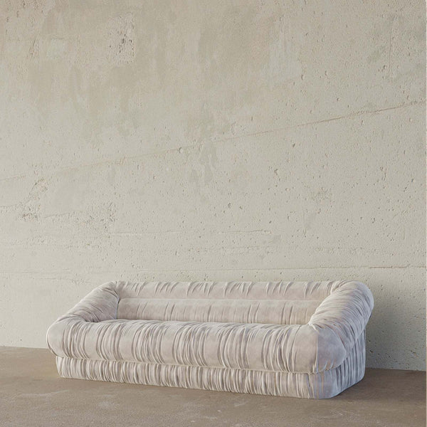 Dune 3S Sofa in off-white velvet with vertical ruching and padded armrests